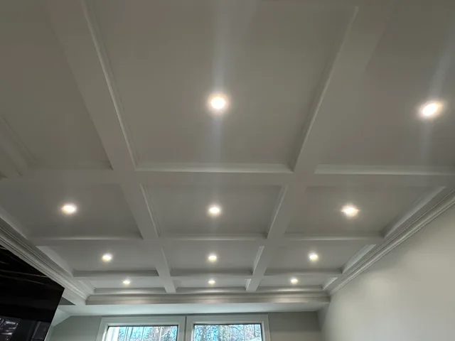 Finished coffered ceiling with recessed lighting