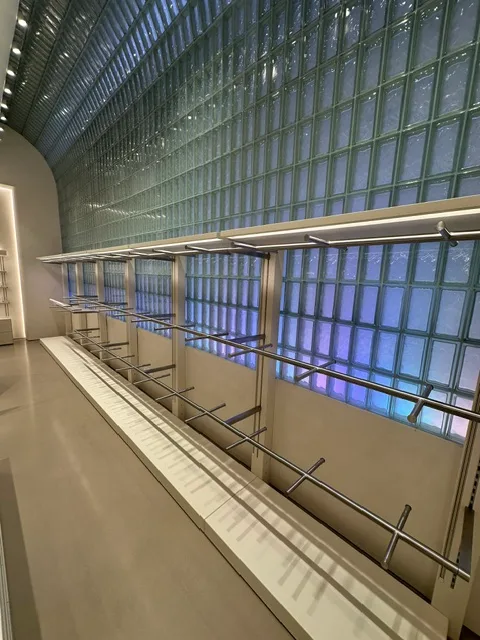 Commercial interior with a glass-block wall by Elite Construction Group